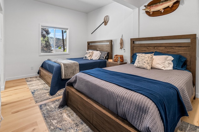 12916 N Newman St, Newman Lake, WA 99025 - bedroom featuring wood finished floors and baseboards