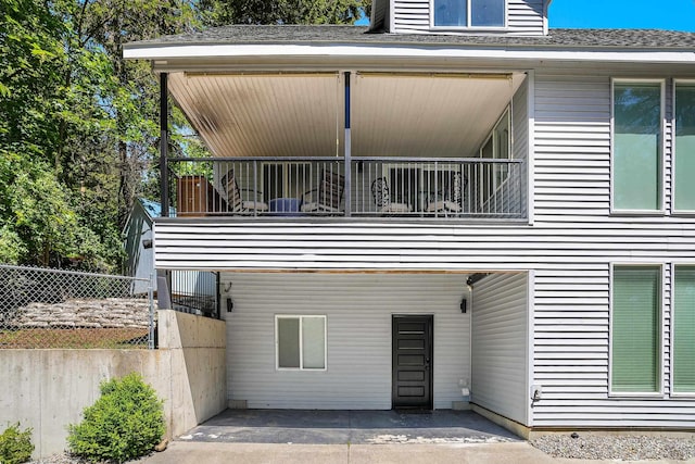 12916 N Newman St, Newman Lake, WA 99025 - back of house featuring a balcony and roof with shingles