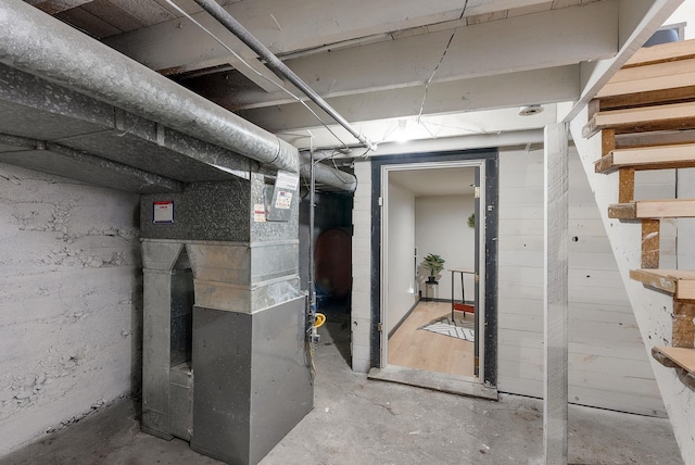 1509 N Lee St, Spokane, WA 99207 - unfinished below grade area featuring heating unit and stairway