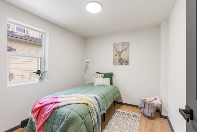 1509 N Lee St, Spokane, WA 99207 - bedroom with wood finished floors and baseboards