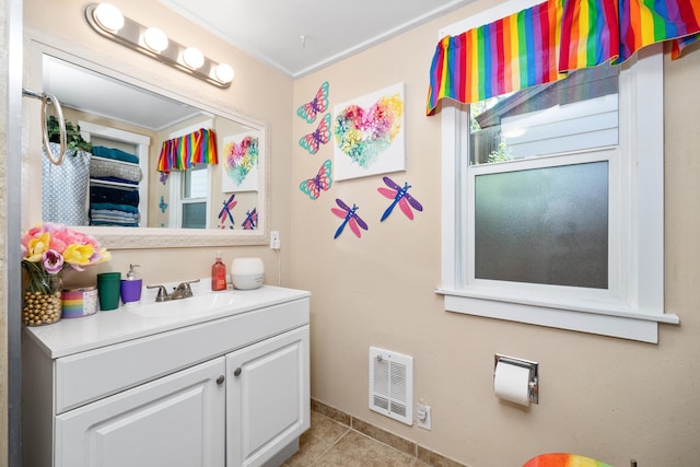 1503 E Dalton Ave, Spokane, WA 99207 - bathroom with vanity, tile patterned floors, and baseboards