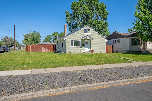 1503 E Dalton Ave, Spokane, WA 99207 - bungalow-style house featuring a chimney