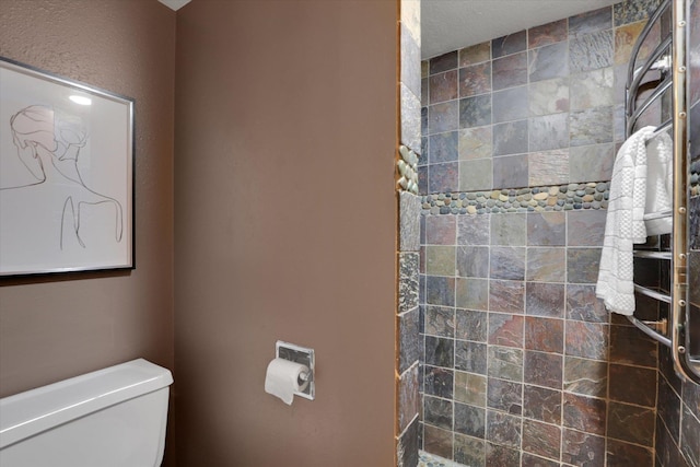 1002 W 7th Ave Unit 301, Spokane, WA 99204 - bathroom featuring toilet and tiled shower