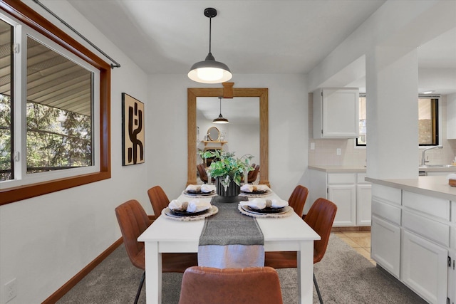 1002 W 7th Ave Unit 301, Spokane, WA 99204 - dining space with light colored carpet