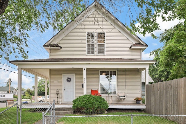 703 E Montgomery Ave, Spokane, WA 99207 - view of front of home with covered porch and roof with shingles
