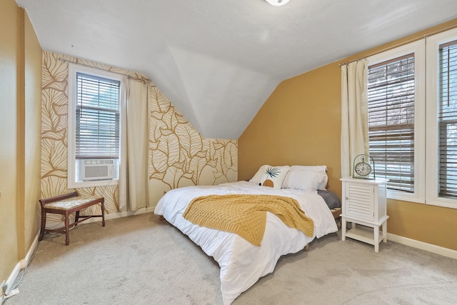 703 E Montgomery Ave, Spokane, WA 99207 - carpeted bedroom featuring vaulted ceiling and baseboards
