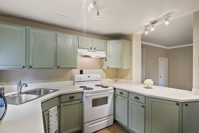 703 E Montgomery Ave, Spokane, WA 99207 - kitchen with white range with electric stovetop, under cabinet range hood, a peninsula, a sink, and track lighting