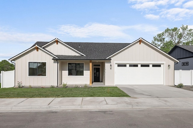 1817 N Arties Rd, Spokane Valley, WA 99016 - modern farmhouse with a garage, board and batten siding, a shingled roof, and driveway
