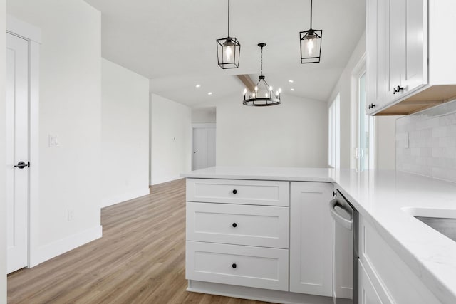 1817 N Arties Rd, Spokane Valley, WA 99016 - kitchen featuring a peninsula, white cabinets, light wood-style floors, backsplash, and recessed lighting