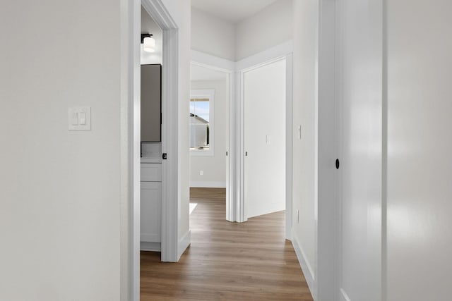 1817 N Arties Rd, Spokane Valley, WA 99016 - corridor featuring baseboards and light wood-style flooring