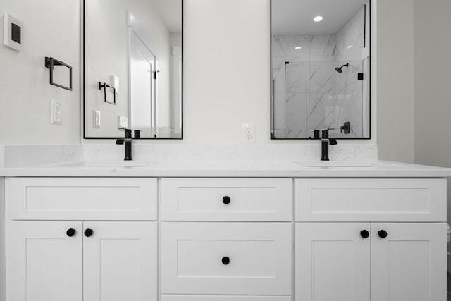 1817 N Arties Rd, Spokane Valley, WA 99016 - bathroom with a marble finish shower, double vanity, and recessed lighting