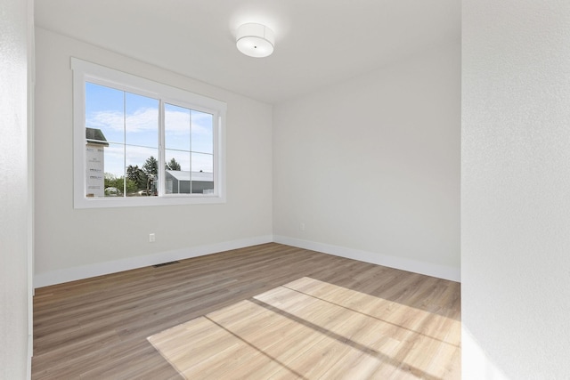 1817 N Arties Rd, Spokane Valley, WA 99016 - unfurnished room with wood finished floors and baseboards