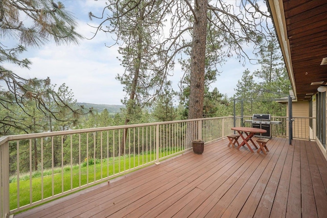 16905 N Mockingbird Ct, Nine Mile Falls, WA 99026 - wooden deck featuring grilling area and a yard