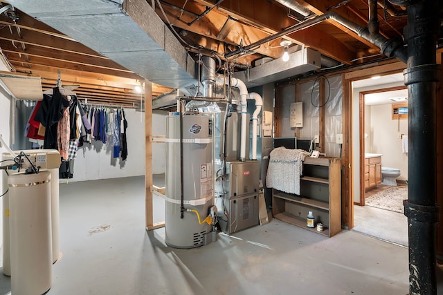 2825 W Woodside Ave, Spokane, WA 99208 - unfinished below grade area with secured water heater, heating unit, and a water softener