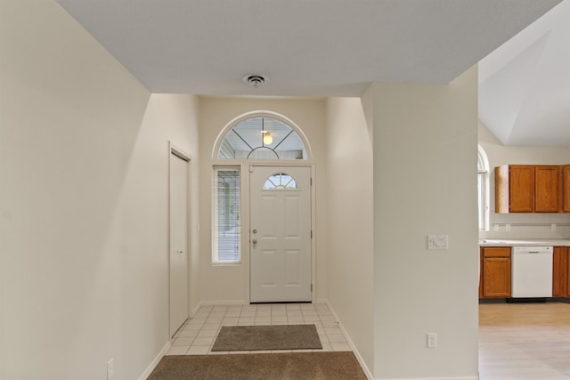 221 E Rockwood Blvd Unit 12, Spokane, WA 99202 - foyer with healthy amount of natural light, baseboards, and light tile patterned flooring