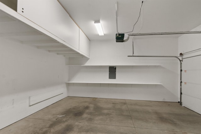 221 E Rockwood Blvd Unit 12, Spokane, WA 99202 - garage featuring electric panel and a garage door opener