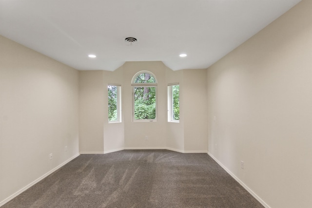 221 E Rockwood Blvd Unit 12, Spokane, WA 99202 - spare room featuring dark colored carpet, baseboards, and recessed lighting