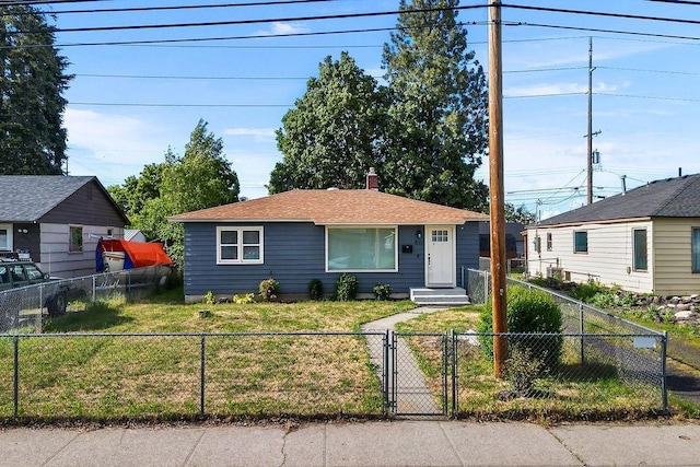 811 E Dalke Ave, Spokane, WA 99208 - view of front of home featuring a gate and a chimney