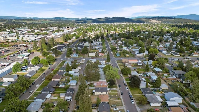 811 E Dalke Ave, Spokane, WA 99208 - aerial view of property's location with a mountain backdrop and nearby suburban area