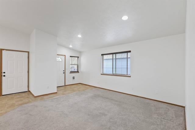 6021 N Addison St, Spokane, WA 99208 - spare room featuring recessed lighting, baseboards, vaulted ceiling, and light colored carpet
