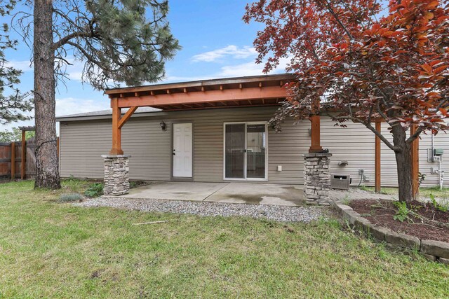 6021 N Addison St, Spokane, WA 99208 - rear view of house with a patio