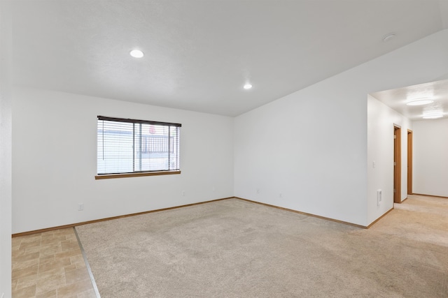 6021 N Addison St, Spokane, WA 99208 - empty room featuring recessed lighting, light carpet, and baseboards