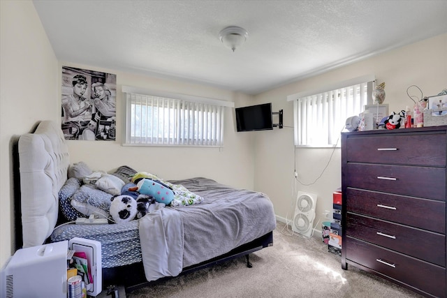 9715 E Nora Ave, Spokane Valley, WA 99206 - bedroom with carpet floors and baseboards