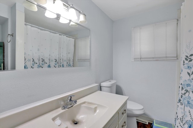 9715 E Nora Ave, Spokane Valley, WA 99206 - full bathroom with vanity, toilet, and a shower with curtain