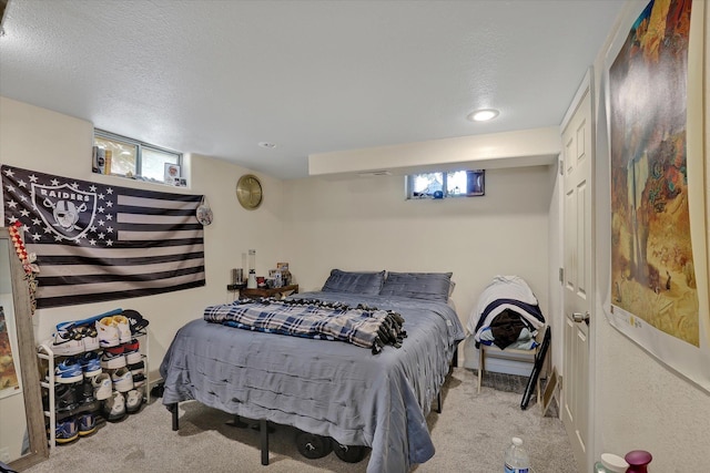 9715 E Nora Ave, Spokane Valley, WA 99206 - bedroom with carpet, multiple windows, recessed lighting, and a textured ceiling