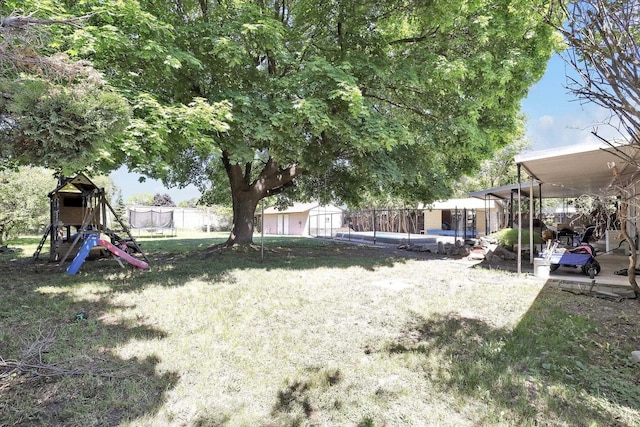 9715 E Nora Ave, Spokane Valley, WA 99206 - view of yard with a swimming pool