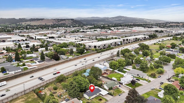 9715 E Nora Ave, Spokane Valley, WA 99206 - drone / aerial view of a mountain backdrop and a main thoroughfare