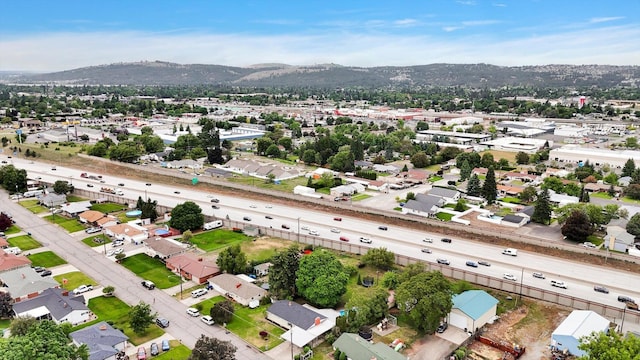 9715 E Nora Ave, Spokane Valley, WA 99206 - aerial view of property and surrounding area with mountains and nearby suburban area