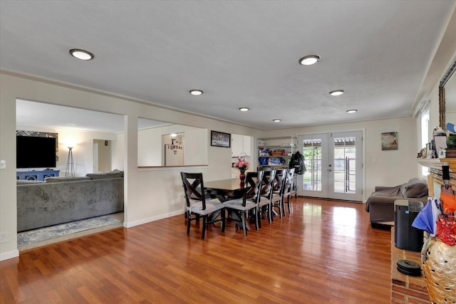 9715 E Nora Ave, Spokane Valley, WA 99206 - dining space with wood finished floors, recessed lighting, baseboards, and crown molding