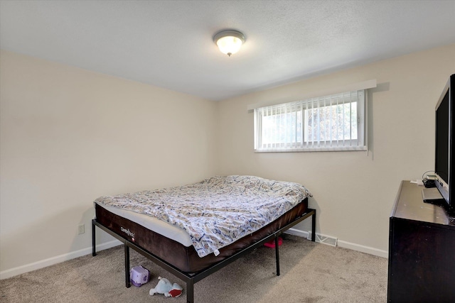 9715 E Nora Ave, Spokane Valley, WA 99206 - carpeted bedroom featuring baseboards