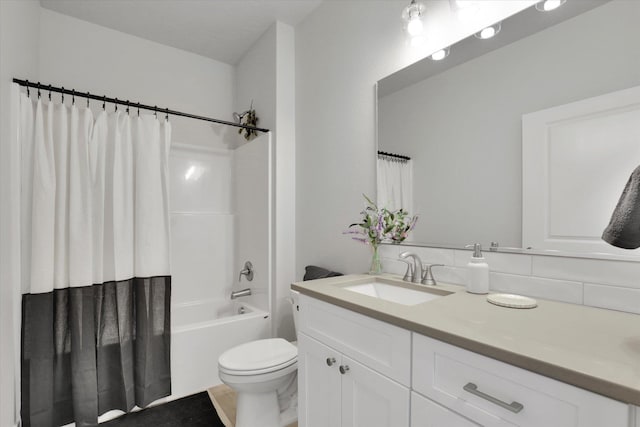 1109 N Country Club Dr Unit 20, Deer Park, WA 99006 - bathroom with vanity, toilet, tasteful backsplash, and shower / tub combo