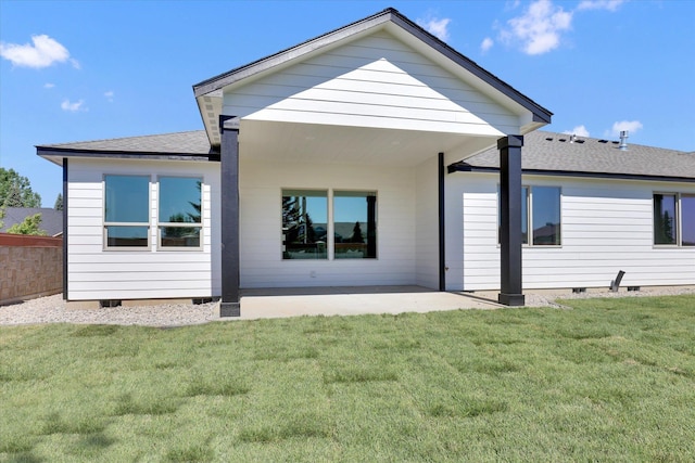 1109 N Country Club Dr Unit 20, Deer Park, WA 99006 - back of property with a shingled roof, a patio, crawl space, and a yard
