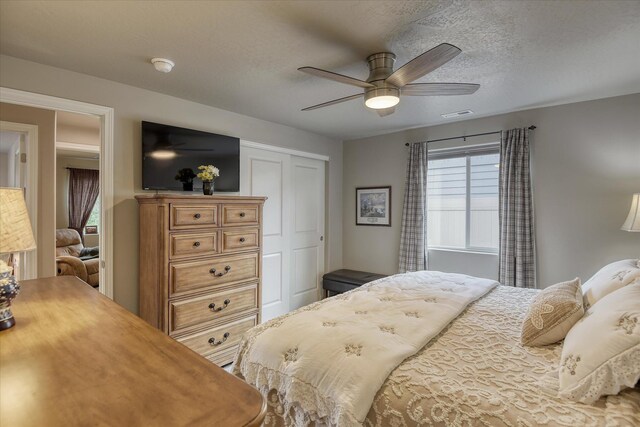 8202 W Quaking Rd, Spokane, WA 99224 - bedroom with a closet and ceiling fan