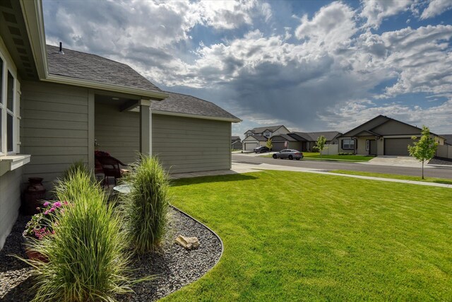 8202 W Quaking Rd, Spokane, WA 99224 - view of grassy yard featuring a residential view