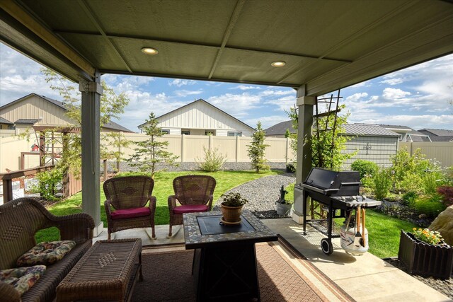 8202 W Quaking Rd, Spokane, WA 99224 - fenced backyard with a patio area