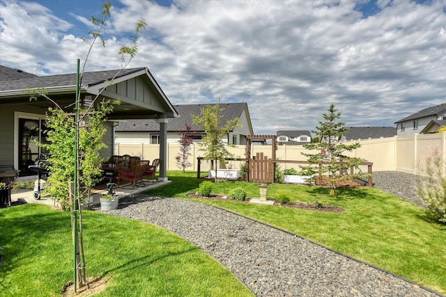 8202 W Quaking Rd, Spokane, WA 99224 - view of yard with a patio and a residential view