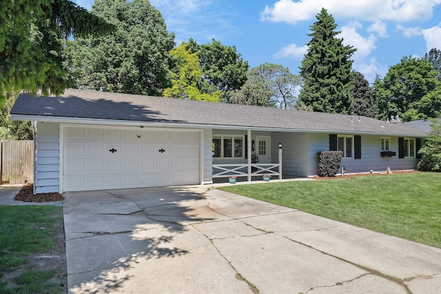 1919 E 59th Ave, Spokane, WA 99223 - ranch-style house featuring driveway, an attached garage, and roof with shingles