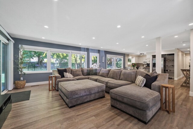 1919 E 59th Ave, Spokane, WA 99223 - living area with baseboards, light wood-style floors, healthy amount of natural light, and recessed lighting