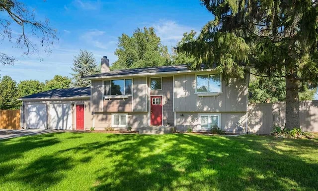 512 N Bessie Rd, Spokane, WA 99212 - view of front of home featuring a chimney, a garage, and driveway