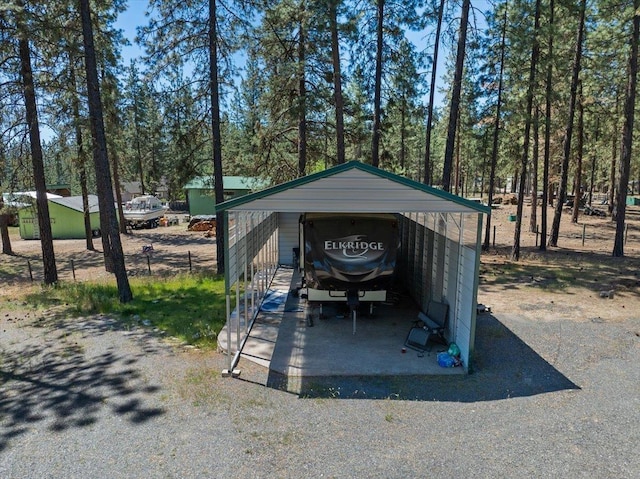 5 Crestview Rd, Kettle Falls, WA 99141 - view of car parking with a detached carport and driveway
