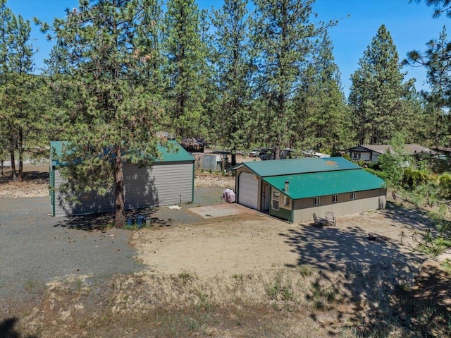 5 Crestview Rd, Kettle Falls, WA 99141 - exterior space featuring an outdoor structure and metal roof