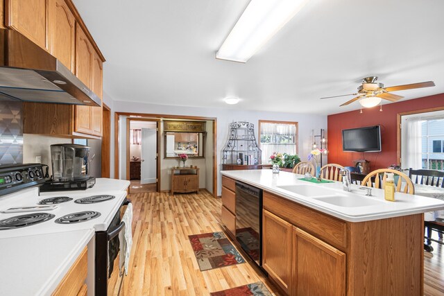 202 W Columbia Ave, Spokane, WA 99205 - kitchen with electric stove, exhaust hood, dishwasher, and light countertops