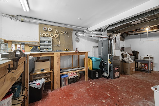 202 W Columbia Ave, Spokane, WA 99205 - unfinished below grade area featuring a workshop area and heating unit