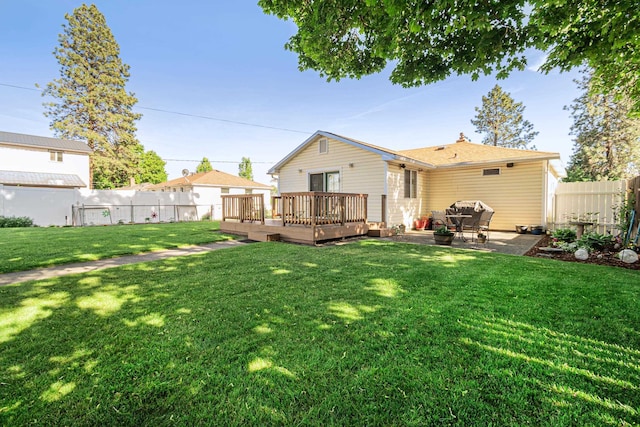 202 W Columbia Ave, Spokane, WA 99205 - back of property featuring a deck and a patio area