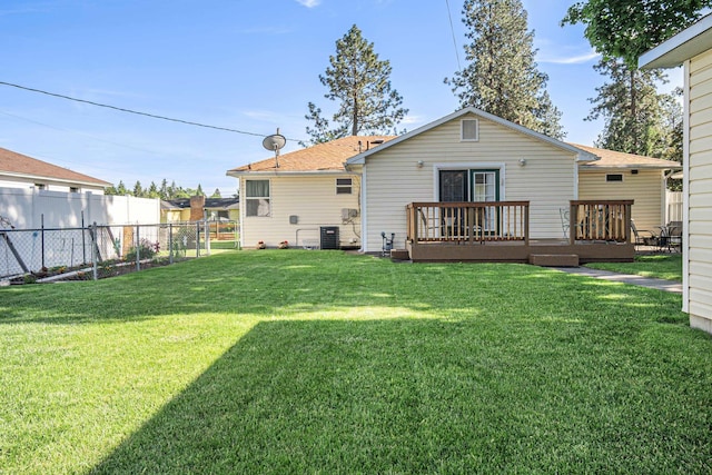202 W Columbia Ave, Spokane, WA 99205 - rear view of house featuring a deck, central AC, and roof with shingles