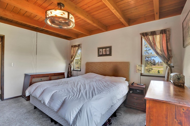 13625 S Sherman Rd, Spokane, WA 99224 - carpeted bedroom with wood ceiling with exposed beams and multiple windows